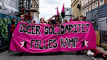 Queer anarchists in Denmark with banner reading "Queer solidarity" Sort blok.jpg