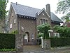 Woonhuis, voorzien van elementen van de Delftse School