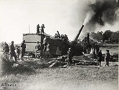 A gun of the 53rd Coastal Artillery, 80th division near Verdun, France. Four shot were fired at a German rail head 30 km away and aerial observers confirmed four hits.[9]