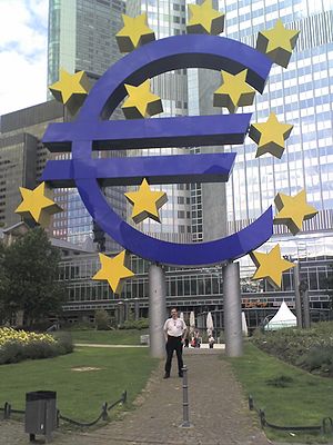 The symbol of the Euro in front of the Europea...