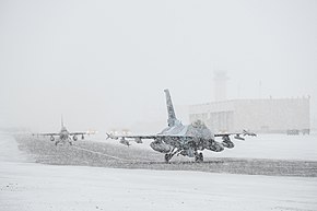 F-16 Fighting Falcons taxi down the runway at Eielson Air Force Base.jpg