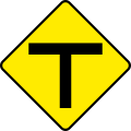 A road sign for a T-junction