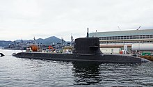 The Soryu-class submarine Unryu in 2014. The Japanese submarines had been widely speculated as the forerunner for the replacement project. JS Unryu(SS-502) in Kure Naval Base 140915-01.JPG