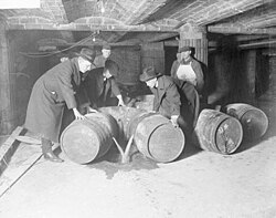 Prohibition agents destroying barrels of alcohol. Prohibition.jpg