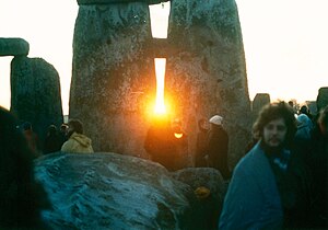 Sunrise between the stones at Stonehenge on th...