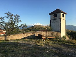 Камбанаријата со оградата