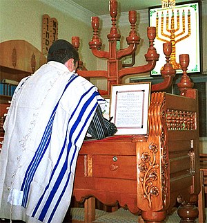 An Iranian Jew prays in a synagogue in Shiraz,...