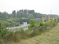 Début de l'autoroute au niveau de l'échangeur de Courtrai-Ouest.