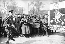 Soviet soldiers celebrating the surrender of the German forces in Berlin, 2 May 1945 Bundesarchiv Bild 183-E0406-0022-018, Berlin, Siegesfeier der Roten Armee.jpg