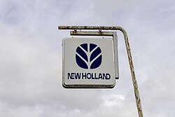 Cartel de New Holland.jpg