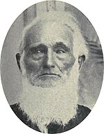 Photograph of a man with a white Shenandoah beard