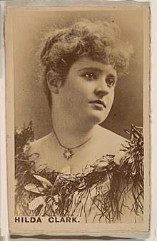 Portrait of women looking over her left shoulder