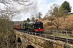 46100 Royal Scot pulls a train over a bridge on the North Yorkshire Moors Railway in 2017