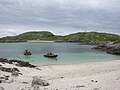 Lagoon on Pabbay Mor with some small boats in it