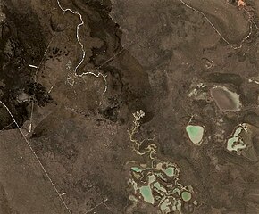 Olenti'nin son kısmı (sol üst) ve Tuzdy Gölü (sağ alt), Sentinel-2 görüntüsü — Kaynak, — Ağız, Kazakistan