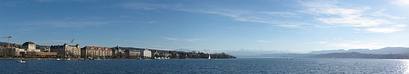 View of the Zürich and the Swiss alps from the edge of Lake Zürich.