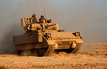 A M2A3 Bradley operating near Fallujah, Iraq, in November 2004. The main recognition feature of the M2/M3A3 is the Commander's Independent Viewer (CIV), at the right rear of the turret. Pi111804a1.jpg