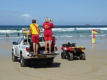 RNLI lifeguards on duty at Sennen in Cornwall RNLI lifeguards on duty on Sennen beach (geograph 4641879).jpg