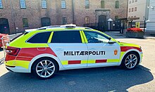 A Skoda Superb in a new livery at Fort Akershus in Oslo Right side view of Norwegian military police vehicle at Fort Akershus, Oslo.jpg