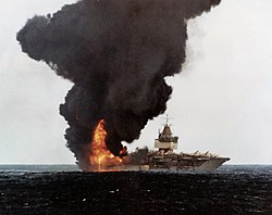 USS Enterprise (CVN-65) burning, stern view