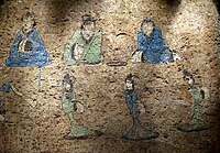 Men and women dressing in the Han dynasty Shên-i (Hanfu), on a wall mural from the late Western Han dynasty (202 BC - 9 AD) or even Xin Dynasty era (9-25 AD) tomb in Houtun Village (Houtun cun, 后屯村), Dongping County (Dongping xian, 东平县), Shandong Province.