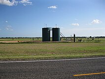 Oil well is one of several along FM 961. This lease is 1.2 miles northwest of Future I-69/US 59.