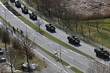 A U.S. Army convoy in Vilseck, Germany during Operation Atlantic Resolve, NATO's efforts to reassert its military presence in central and eastern Europe that began in April 2014. 2CR returns home to Vilseck (16999448822).jpg