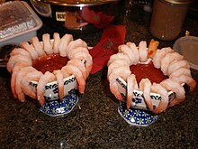 2 servings of cocktail shrimp with dipping sauce.JPG