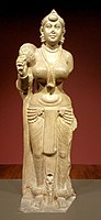 تمثال يصور ديدارغانج ياكشي تلف لباس دوتي ، 300 قبل الميلاد.