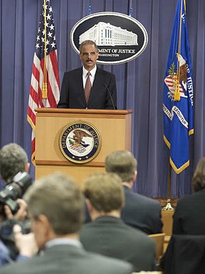 English: Eric Holder speaking at a press confe...