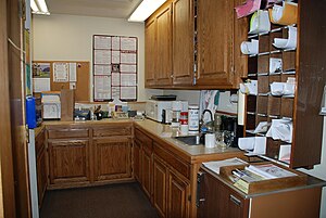 English: A typical mailroom and kitchenette