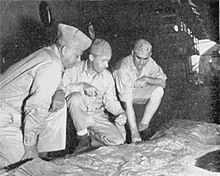 Left to right: Major General Geiger, Corps Commander; Colonel Silverthorn, Corps Chief of Staff and Brigadier General del Valle, Corps Artillery Commander, examine a plaster relief map of Guam on board the USS Appalachian. Pedro del Valle2.jpg