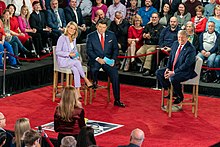 MacCallum and Bret Baier moderate a town hall with President Donald Trump in 2020 President Trump at the Fox News Town Hall (49627380273).jpg