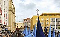 Salida del paso de palio de la Virgen de la Victoria en Miércoles Santo desde su sede canónica.