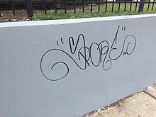 A tag in Dallas, reading "Spore" Tag by Spore.jpg