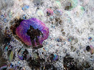 Bubbles left at tide pools after the ocean wat...