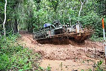 An M1126 infantry carrier vehicle undergoes tropical environment testing at a TRTC site in Hawaii.