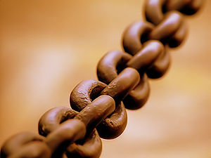A broad metal chain.