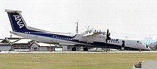 All Nippon Airways Flight 1603, a Bombardier Dash 8 Q400, resting on its nose at Kochi Airport after its nose gear failed to deploy prior to landing, 13 March 2007 Dash 8 2007-3-13 Kochi Airport.jpg