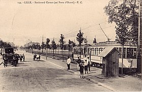 Ancienne carte postale du Grand Boulevard au niveau du poste d'octroi.