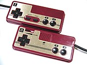 Famicom controllers were simple in design, though they included a number of features, such as a microphone, missing from their NES counterparts.
