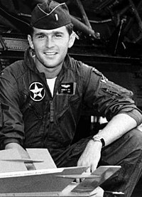 Lt. George W. Bush during his service in the Texas Air National Guard as an F-102 Delta Dagger pilot of the 111th Fighter-Interceptor Squadron, at Ellington Field, Houston GW-Bush-in-uniform.jpg