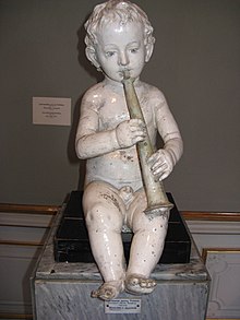 פסל ילד מנגן מאת ג'ובאני דלה רוביה בארמיטאז'