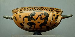 Falmouth-maalarin maalaama komastes-malja -tyypin kyliks, n. 560 eaa.