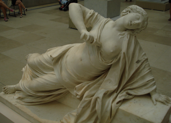 Marble statue of Lucretia committing suicide after her rape, by 18th century French sculptor Philippe Bertrand. In the collection of the Metropolitan Museum of Art.