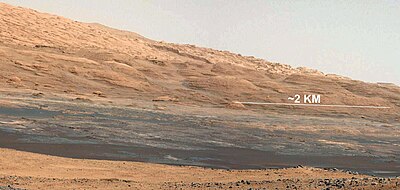 Curiosity's view of Aeolis Mons ("Mount Sharp") foothills on August 9, 2012, EDT (white balanced image) PIA16068 - Mars Curiosity Rover - Aeolis Mons - 20120817.jpg