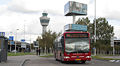 Verkeerstoren en bus van Schiphol Sternet