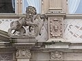 Lion of central portal and reliefs of façade