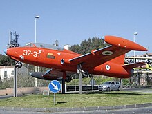 Aermacchi MB-326E on a roundabout in Catania, Sicily, near Fontanarossa airport. Aermacchi MB-326E 31-37 Catania.jpg