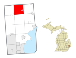 Location within Macomb County (red) and the administered village of Armada (pink)